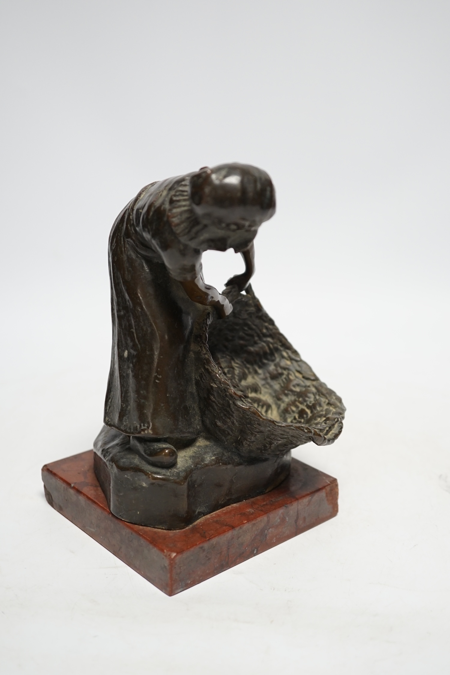 Rudolf Marcuse (German 1878- 1940), bronze of a girl with basket, on rouge marble base, 19cm